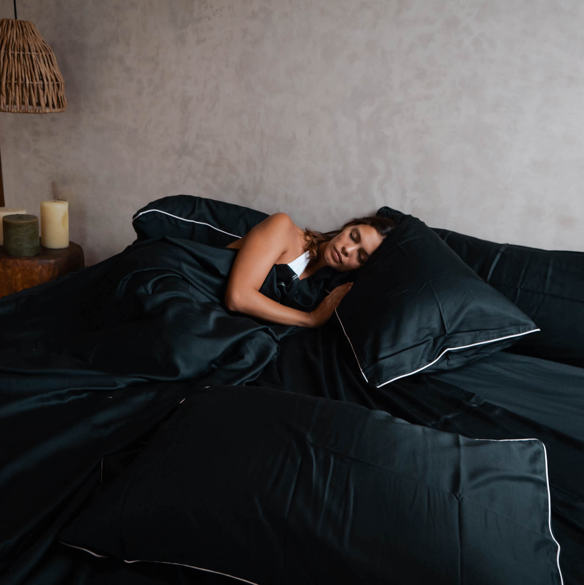 Luxury BRISA cooling bedding set in modern bedroom showing airy and breathable summer comfort